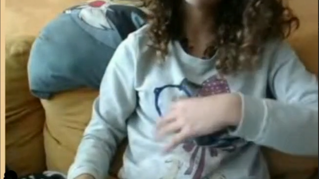 Curly Cam Teen touches her clit 